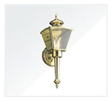 Gold Colored Outside Lamp Shaped Like A Lantern.