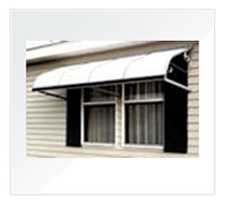 Windows With A White Aluminum Awning.