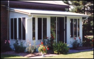 Enclosed Three Season Sun Room With Large Windows On All Sides